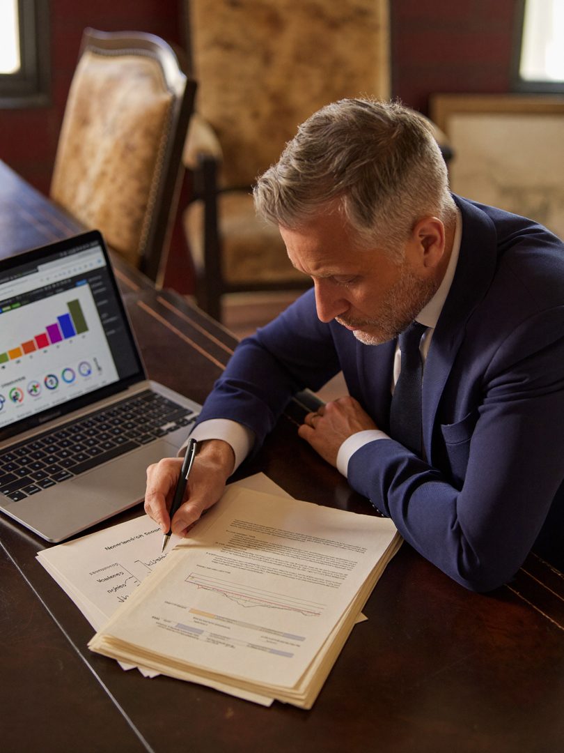 An advisory working session reviewing a company&rsquo;s performance